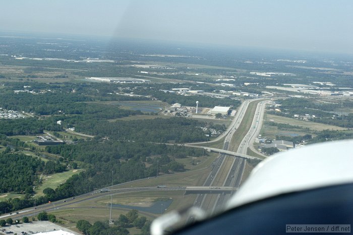 southwest-bound along I-4 with the white water tower (listed as orange in the NOTAM)