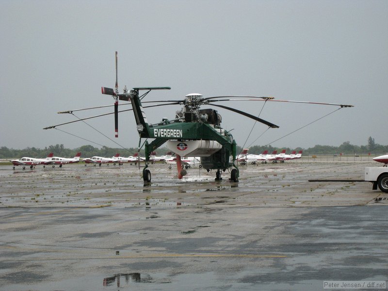 Evergreen Aviation Sikorsky S-64 with FIT's fleet of Warriors in the background at MLB