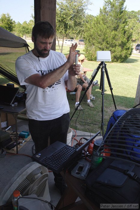 Jim looking for Wifi with my 8dBi 900 Mhz patch antenna in the background