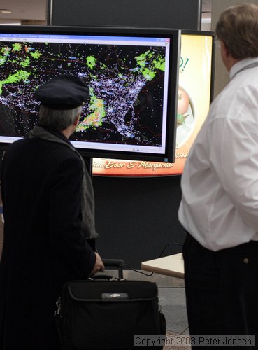 nice FAA guys doing PR in the Denver airport showing weather superimposed on IFR traffic