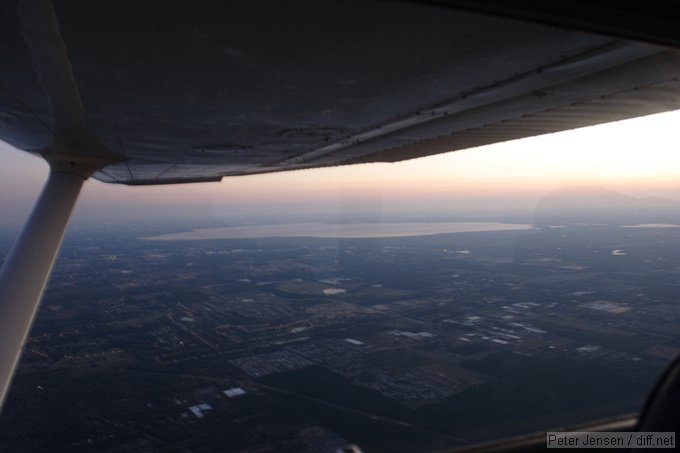 looking west out over Orlando on the slow trip back into the headwind