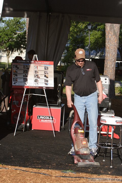 vacuuming out the booth