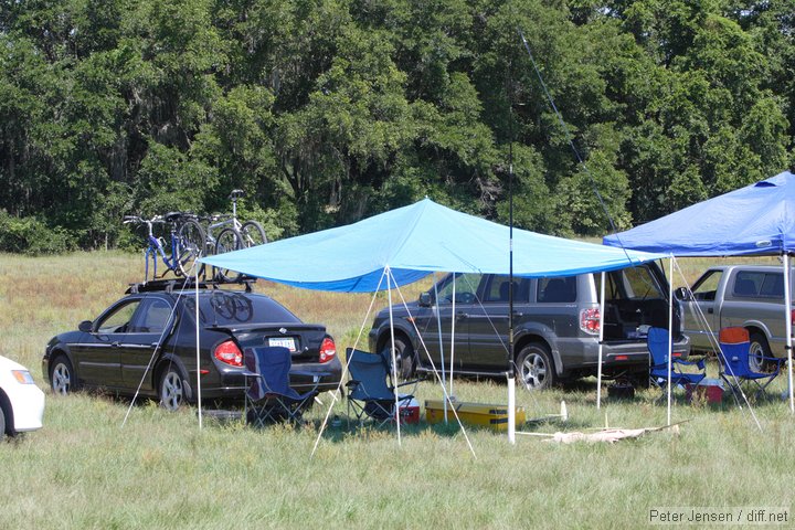 $10 outdoor tent from Wal-Mart - takes about $70 of labor to erect and could easily fall and destroy a $600 plane :)