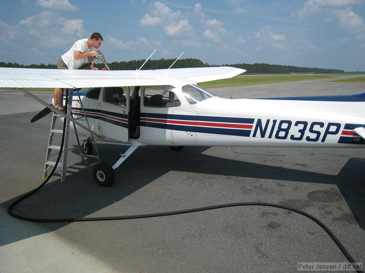 Steve fueling N183SP at Homerville, KHOE ($4.45/gal)