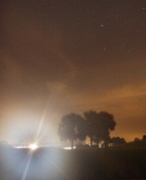 another Perseid, unfortunately blasted with flare by an utility vehicle doing some early-morning golf course work