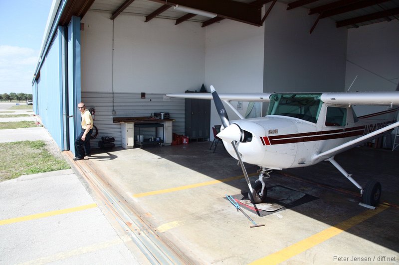 Casey closing the hangar door