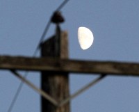 moon over powerlines