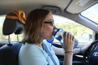 Laura demonstrates proper water drinking