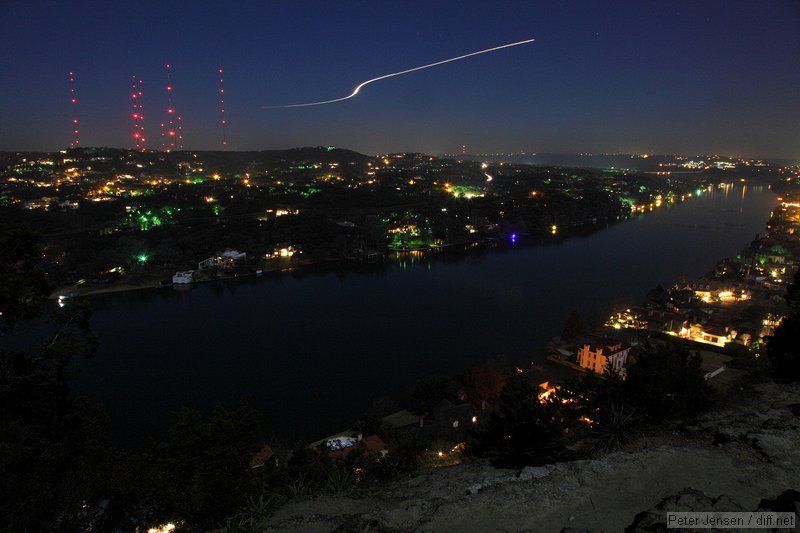 light trail is from a UPS flight out of MMMY (Monterrey, Mexico) inbound to KAUS