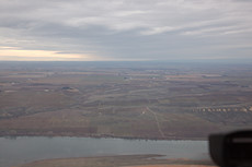 view over the Columbia to a neat grass strip