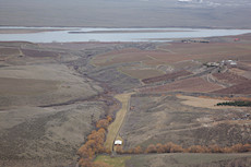 one-way grass strip with the Columbia in the background