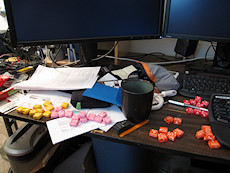 starburst package de-packaged with tweezers through a hole in the back of the flap