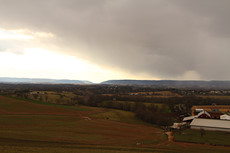 snow flurries coming across the valley