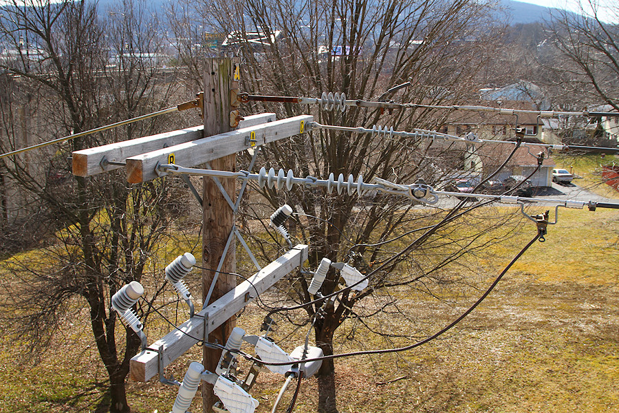 power lines within easy stick range of a bridge - not a great place for kids to be playing...