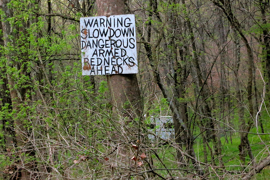 WARNING SLOW DOWN DANGEROUS ARMED REDNECKS AHEAD