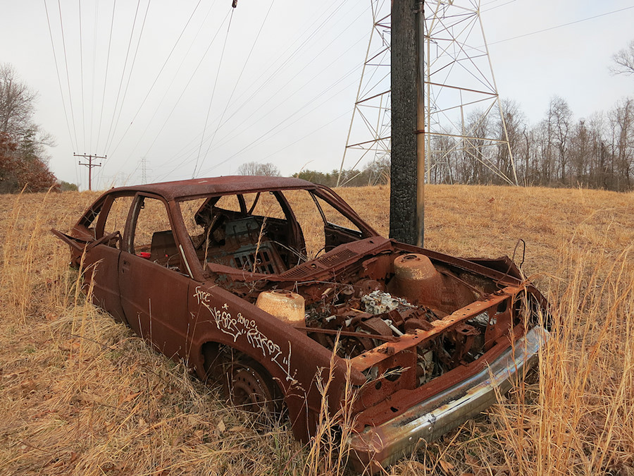 burned out car near the Murray Hill boulders