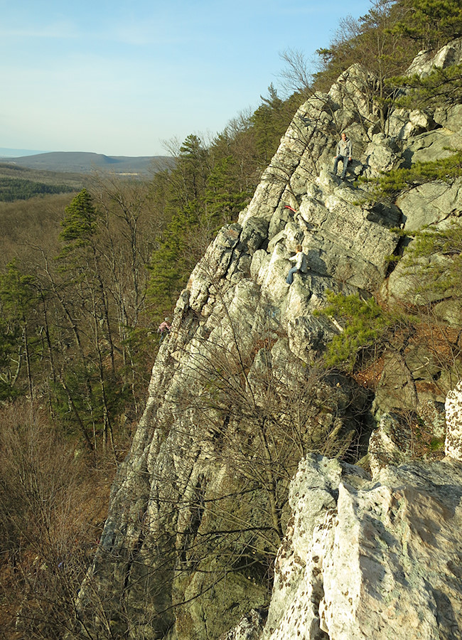 locals enjoying the evening on Pillar #2; climber 