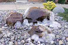 ice on a fountain - time to take a trip to FL