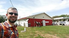 woman had her horse hitched to the satellite dish while grabbing a beer and gatorade for the ride in to the Ocala horse park.