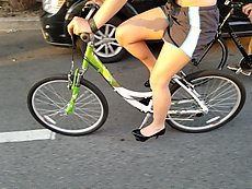 heels on the bike like a boss!