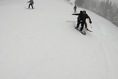 Dave getting taken out by a snowboarder