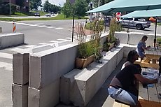 Portland uses these cement waste blocks to separate outdoor dining areas which seems like a great idea